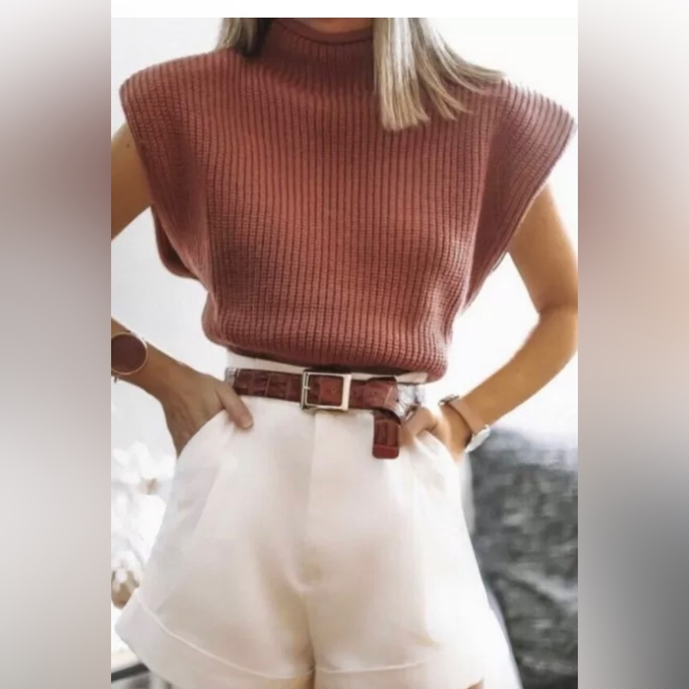 Pink sleeveless padded shoulder knit top